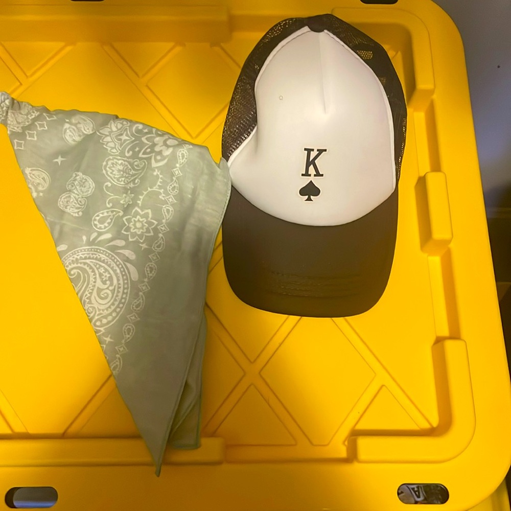Hat has never been worn, neither has the bandana, in good condition